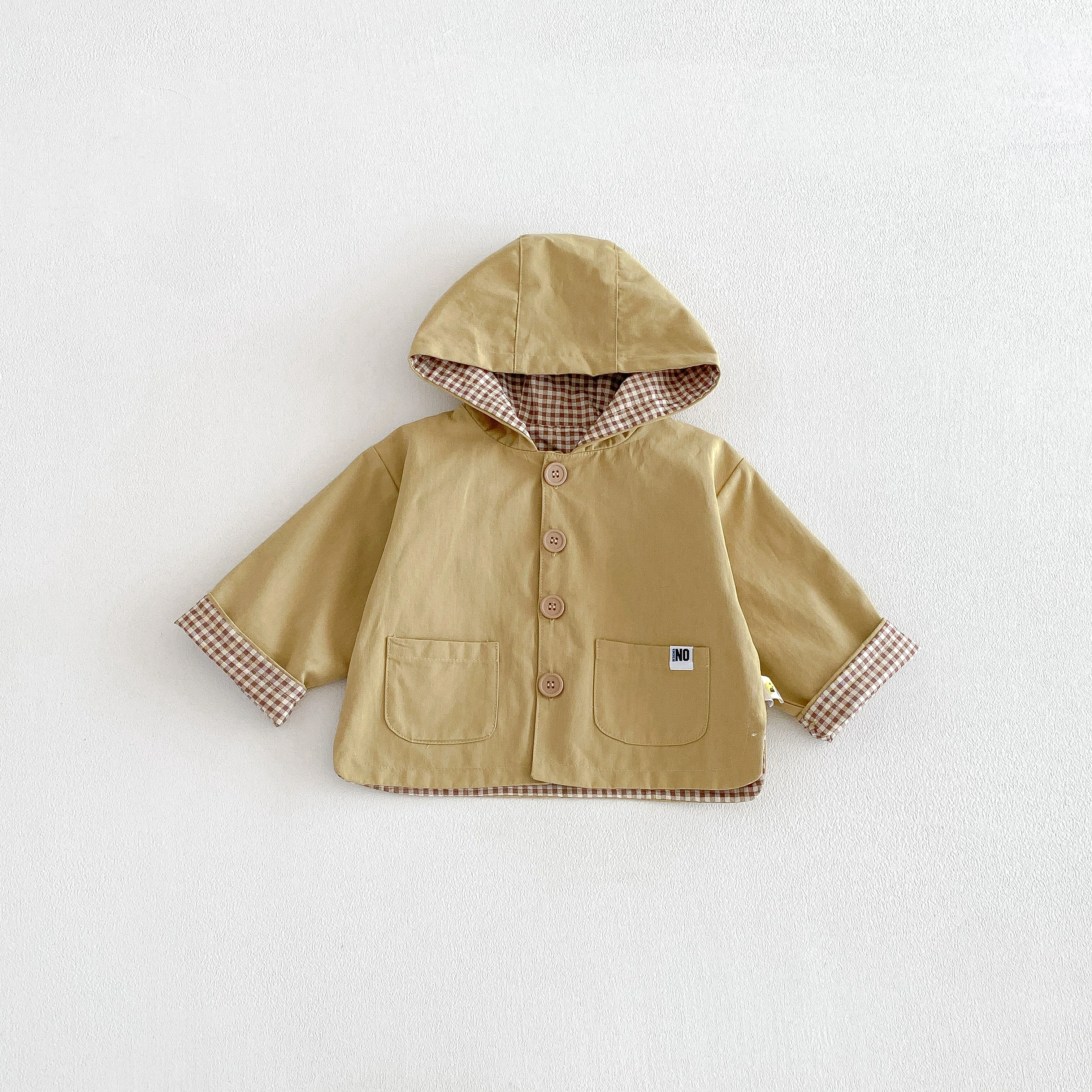 blouson bébé uni avec capuche